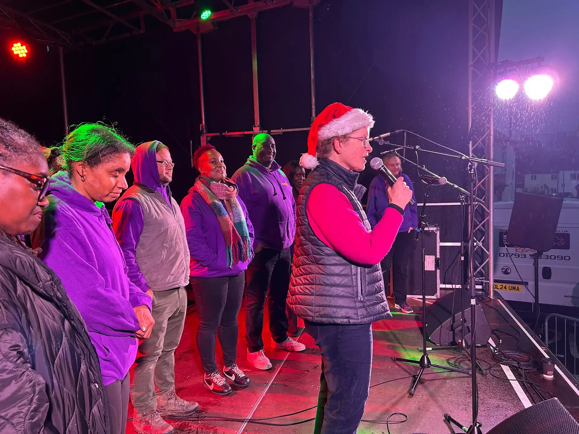 Renewal Choir performing at the Westbury Christmas Lights Switch-On in Market Place, Westbury, Wiltshire