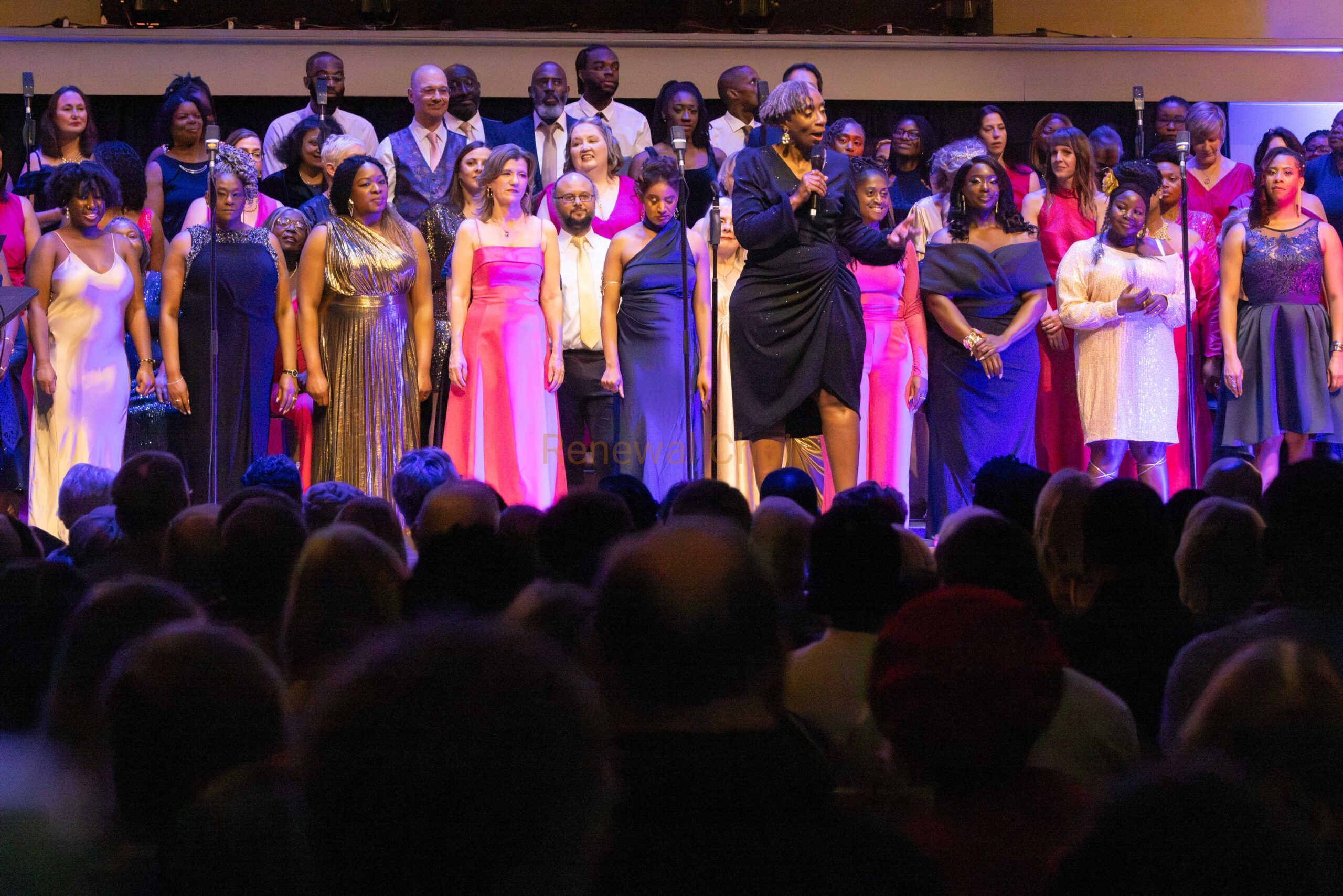 Renewal Choir performing before a full concert audience